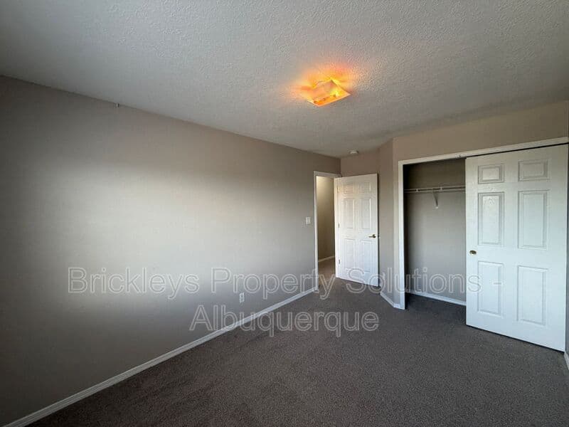 5-bedroom 4.5-bath home at 7008 Tree Line Ave NW for $2,500/mo managed by Brickleys Property Solutions Albuquerque — photo 19 of 43