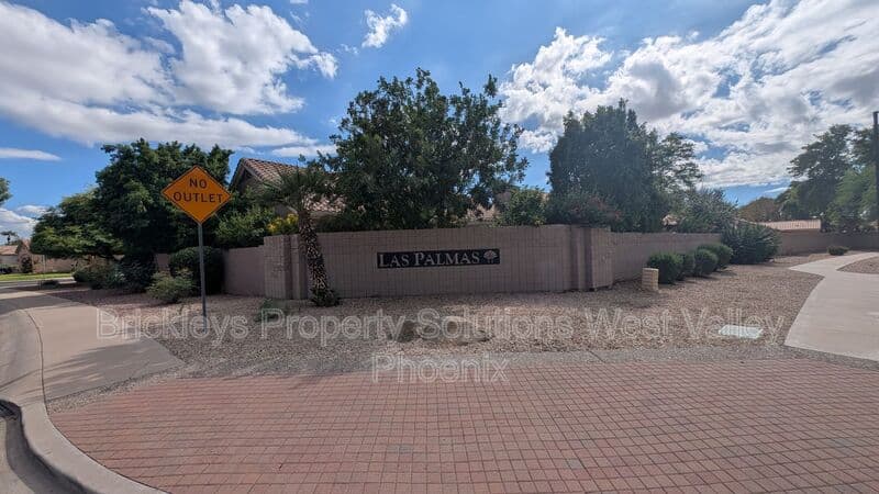 4-bedroom 3-bath home at 13354 W Palm Ln for $2,750/mo managed by Brickleys Property Solutions West Valley Phoenix — photo 4 of 31