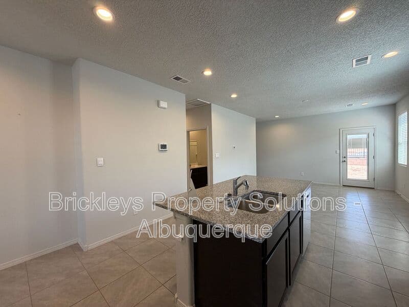 3-bedroom 2-bath home at 1504 Alto Colores for $2,100/mo managed by Brickleys Property Solutions Albuquerque — photo 8 of 30