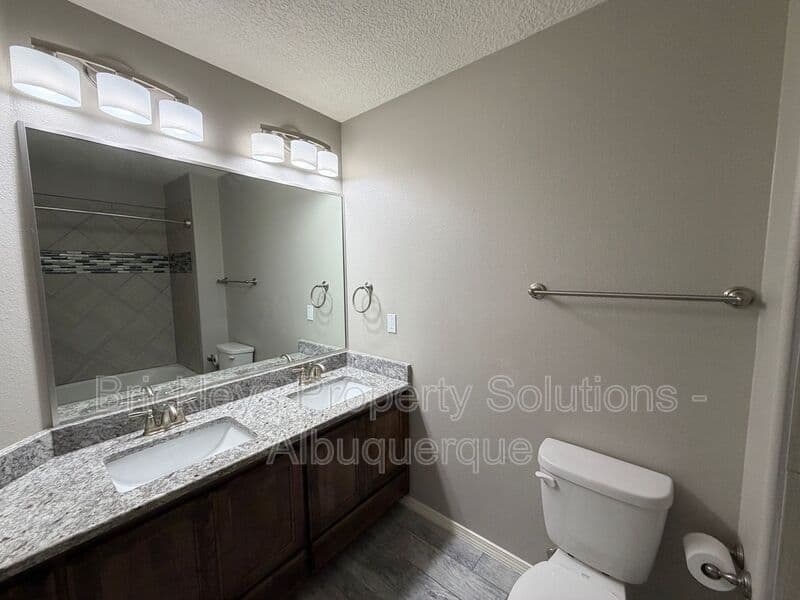 4-bedroom 3-bath home at 860 Fire Wheel Loop for $2,300/mo managed by Brickleys Property Solutions Albuquerque — photo 8 of 40