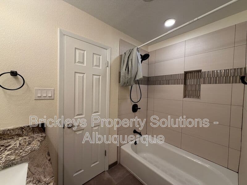 3-bedroom 2-bath home at 2808 Charleston St NE for $2,500/mo managed by Brickleys Property Solutions Albuquerque — photo 16 of 35