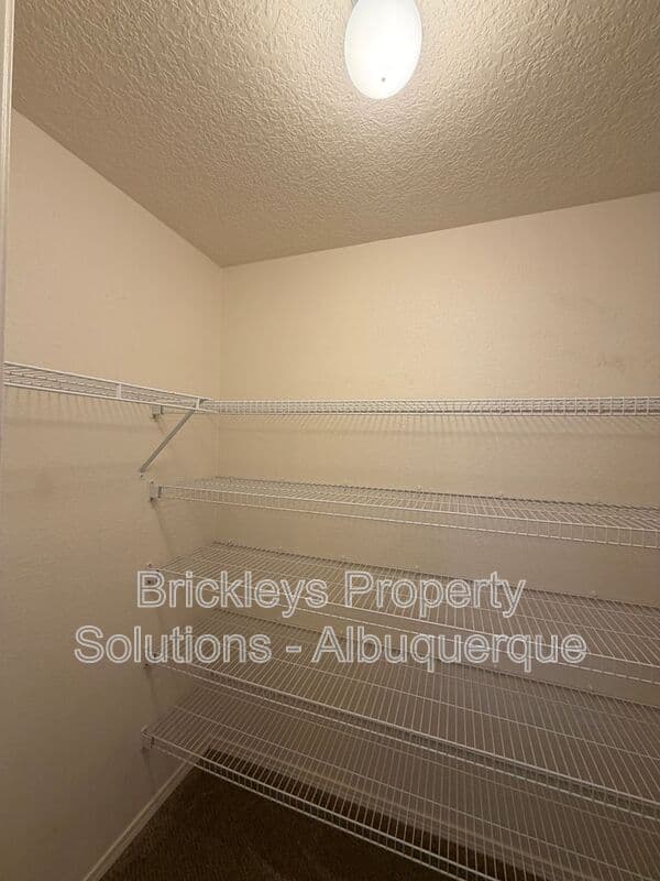 4-bedroom 3-bath home at 1904 Busher St. SE for $2,450/mo managed by Brickleys Property Solutions Albuquerque — photo 31 of 50