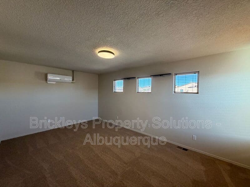 4-bedroom 3.5-bath home at 6228 Nacional Rd NW for $2,700/mo managed by Brickleys Property Solutions Albuquerque — photo 8 of 44