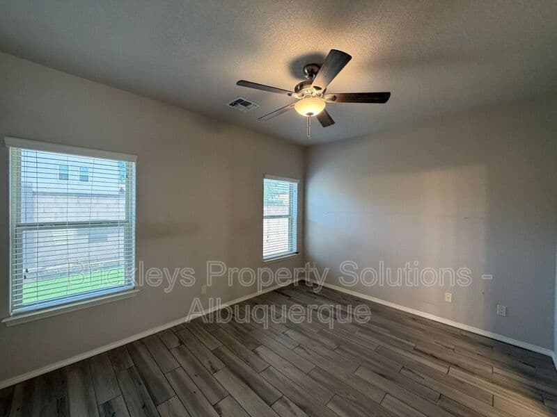 4-bedroom 2.5-bath home at 7420 Tangerine Court NE for $2,450/mo managed by Brickleys Property Solutions Albuquerque — photo 24 of 39