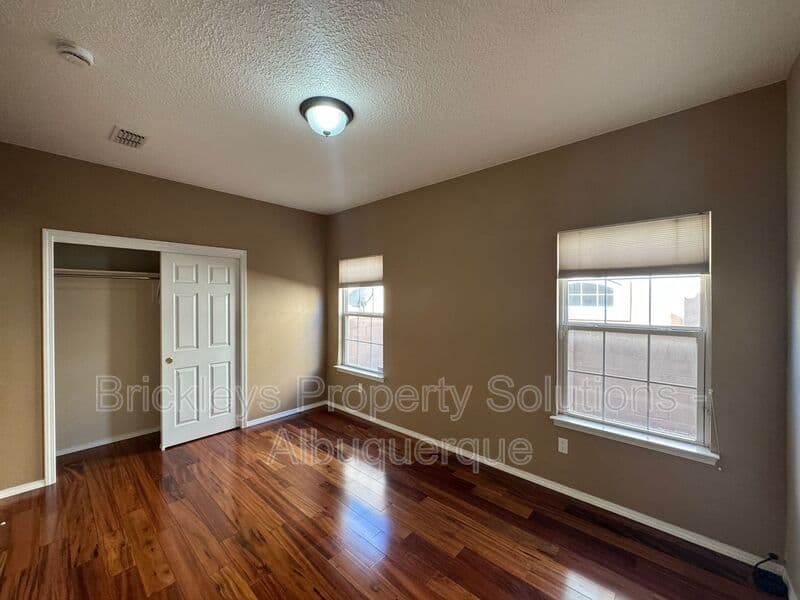 4-bedroom 3-bath home at 7131 Wild Olive Ave NE for $2,900/mo managed by Brickleys Property Solutions Albuquerque — photo 17 of 38
