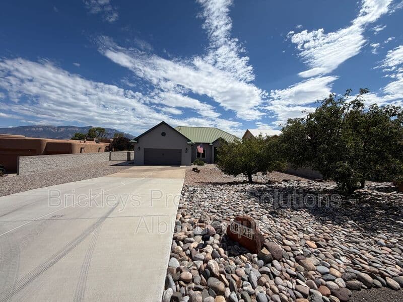 3-bedroom 2-bath home at 6812 Nagoya Rd NE for $2,700/mo managed by Brickleys Property Solutions Albuquerque — photo 2 of 43