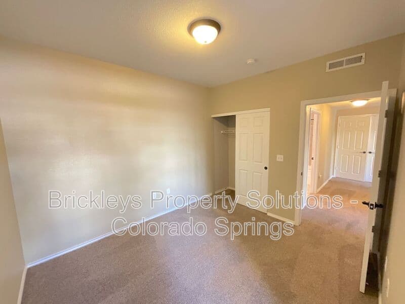 3-bedroom 2-bath home at 3780 Riviera Grove Unit #104 for $1,863/mo total (includes $1,825 base rent + $38 required Tenant Benefit Package) managed by Brickleys Property Solutions Colorado Springs — photo 20 of 24