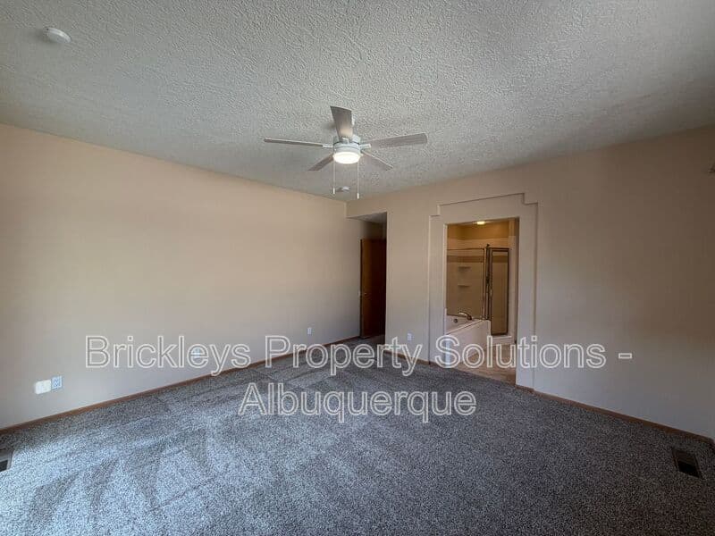 3-bedroom 2-bath home at 12606 Colony Pl NE for $2,250/mo managed by Brickleys Property Solutions Albuquerque — photo 14 of 32