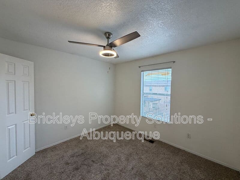 3-bedroom 3-bath home at 5004 Blue Stone Rd NW for $2,250/mo managed by Brickleys Property Solutions Albuquerque — photo 13 of 37