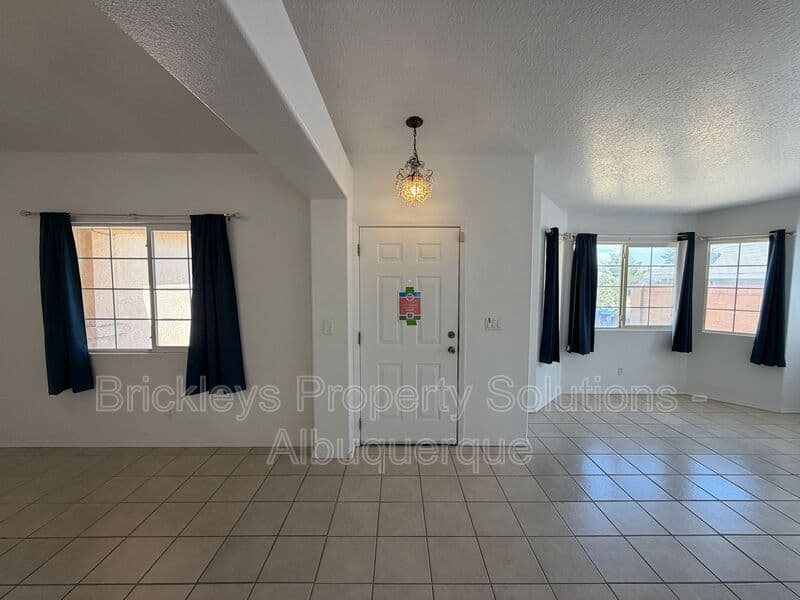 3-bedroom 2-bath home at 1405 Secret Valley Drive SW for $1,800/mo managed by Brickleys Property Solutions Albuquerque — photo 4 of 34