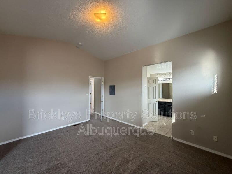 5-bedroom 4.5-bath home at 7008 Tree Line Ave NW for $2,500/mo managed by Brickleys Property Solutions Albuquerque — photo 10 of 43