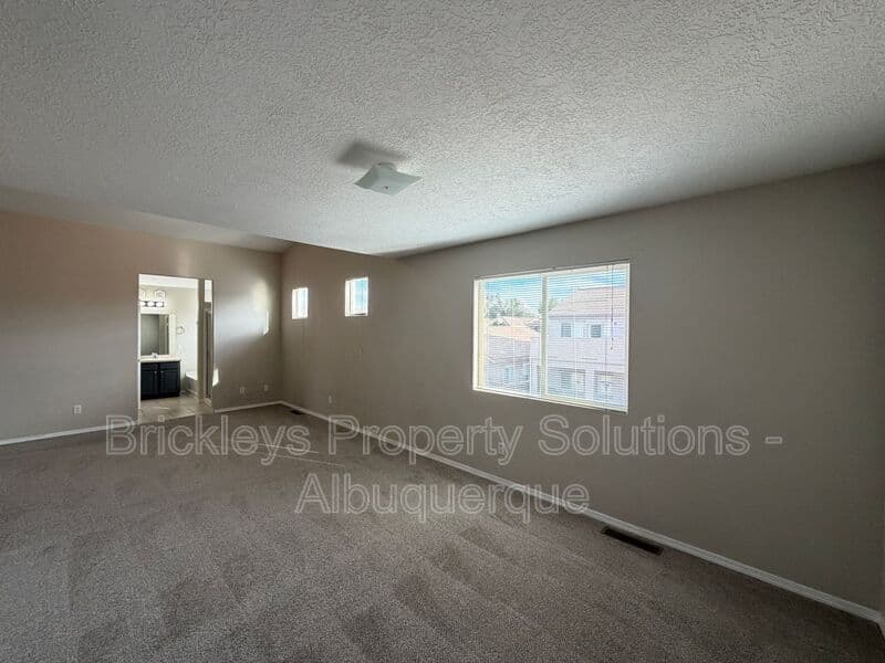 5-bedroom 4.5-bath home at 7008 Tree Line Ave NW for $2,500/mo managed by Brickleys Property Solutions Albuquerque — photo 9 of 43