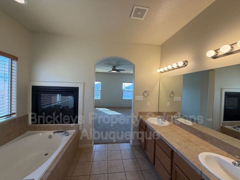 4-bedroom 3.5-bath home at 6228 Nacional Rd NW for $2,700/mo managed by Brickleys Property Solutions Albuquerque — photo 33 of 44