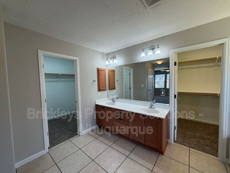 3-bedroom 2.5-bath home at 418 Paseo Roja Pl NE for $2,375/mo managed by Brickleys Property Solutions Albuquerque — photo 22 of 42
