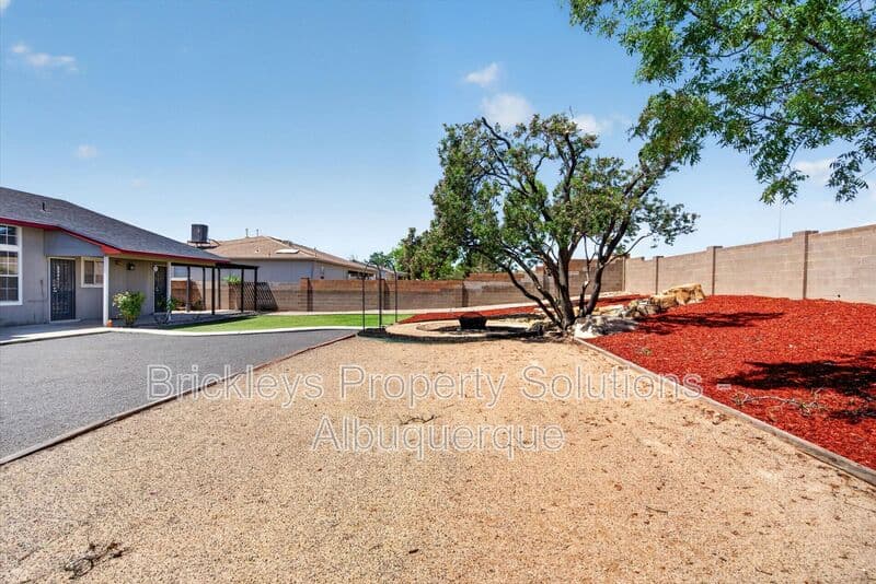 4-bedroom 2-bath home at 2413 Agua Fria Dr NE for $2,275/mo managed by Brickleys Property Solutions Albuquerque — photo 13 of 42