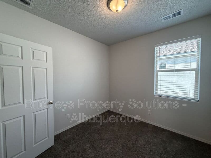3-bedroom 2-bath home at 1504 Alto Colores for $2,100/mo managed by Brickleys Property Solutions Albuquerque — photo 23 of 30