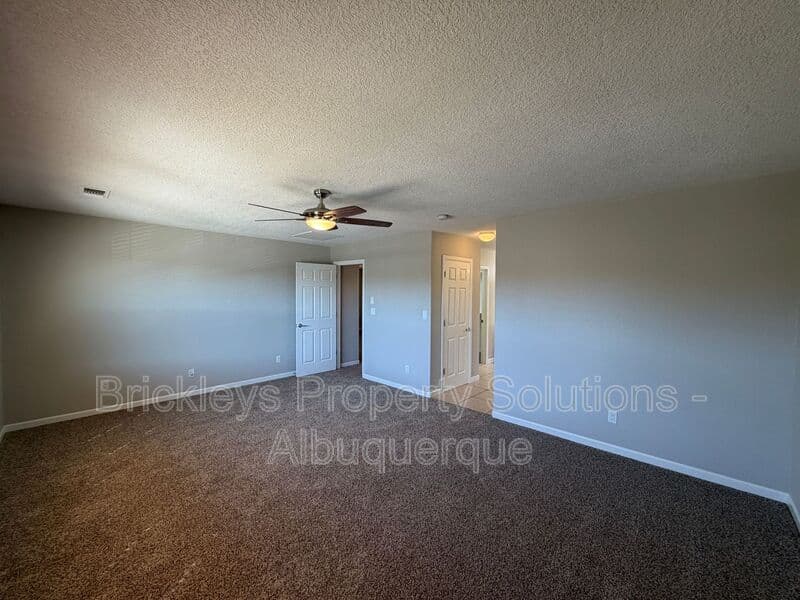3-bedroom 2.5-bath home at 418 Paseo Roja Pl NE for $2,375/mo managed by Brickleys Property Solutions Albuquerque — photo 19 of 42