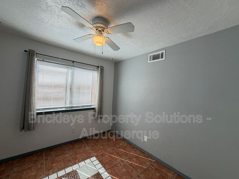 4-bedroom 2-bath home at 5812 Brahma Dr NW for $1,950/mo managed by Brickleys Property Solutions Albuquerque — photo 26 of 35