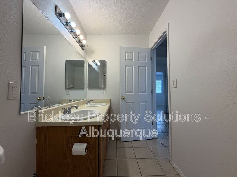 3-bedroom 2-bath home at 1405 Secret Valley Drive SW for $1,800/mo managed by Brickleys Property Solutions Albuquerque — photo 17 of 34