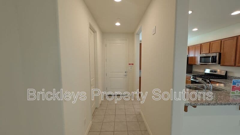 3-bedroom 2.5-bath home at 7042 E Diamond St for $2,900/mo managed by Brickleys Property Solutions East Valley Phoenix — photo 5 of 45