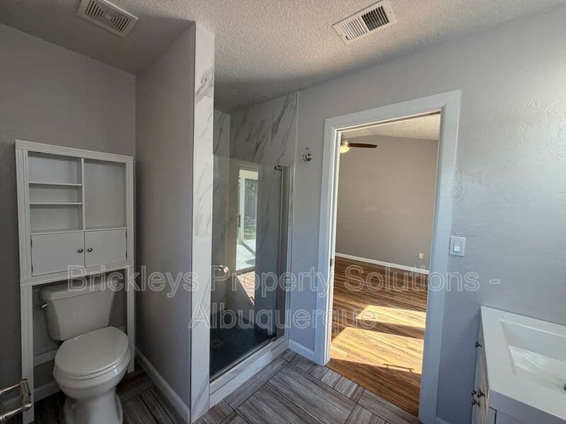 3-bedroom 2-bath home at 7024 Westford Pl NW for $2,200/mo managed by Brickleys Property Solutions Albuquerque — photo 18 of 33