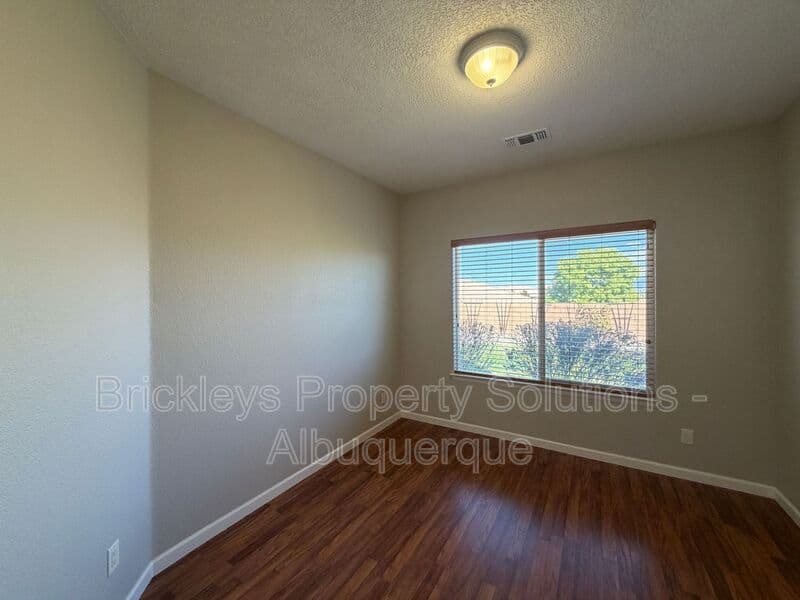 3-bedroom 2.5-bath home at 418 Paseo Roja Pl NE for $2,375/mo managed by Brickleys Property Solutions Albuquerque — photo 30 of 42