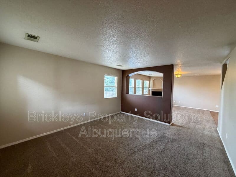 4-bedroom 3-bath home at 1904 Busher St. SE for $2,450/mo managed by Brickleys Property Solutions Albuquerque — photo 5 of 50