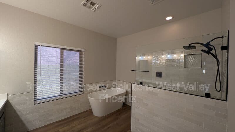4-bedroom 3-bath home at 13354 W Palm Ln for $2,750/mo managed by Brickleys Property Solutions West Valley Phoenix — photo 9 of 31