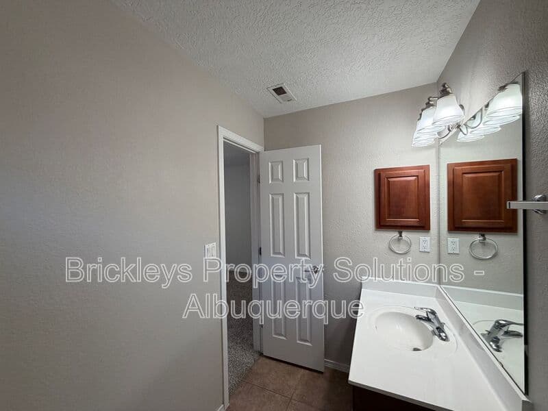 3-bedroom 2-bath home at 8035 Sierra Altos Pl. NW for $2,150/mo managed by Brickleys Property Solutions Albuquerque — photo 15 of 29