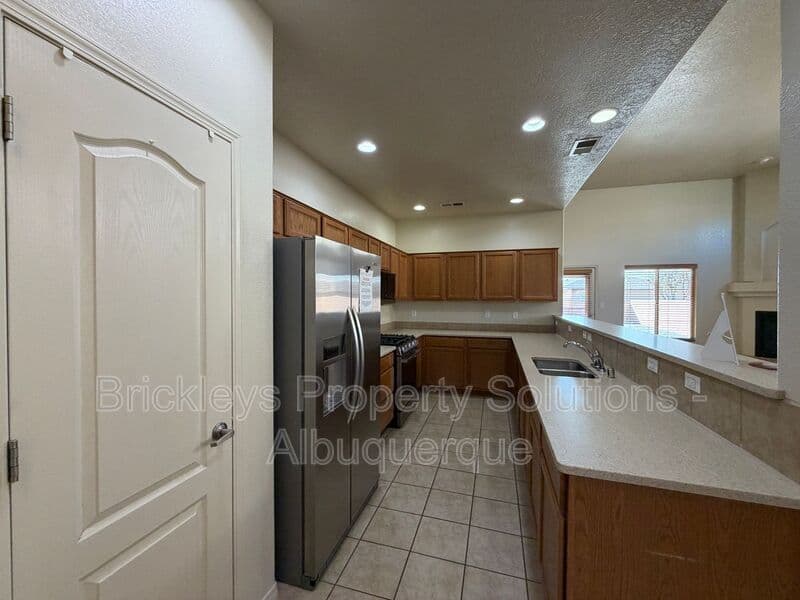 4-bedroom 3.5-bath home at 6228 Nacional Rd NW for $2,700/mo managed by Brickleys Property Solutions Albuquerque — photo 34 of 44