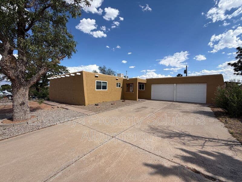 3-bedroom 2-bath home at 5608 Drake Ave NW for $2,100/mo managed by Brickleys Property Solutions Albuquerque